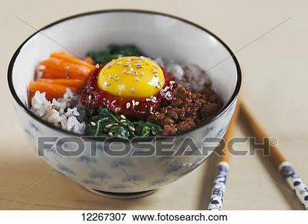 Bibimbap, Korean dish; Edmonton, Alberta, Canada View Large Photo Image Stock Photo - Bibimbap, Korean dish; Edmonton, Alberta, Canada. Fotosearch