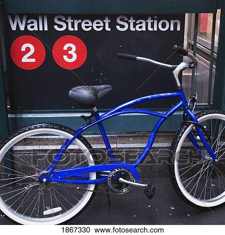 Stock Image - Bicycle Parked On Wall Street, New York City, New York, United States Of America. Fotosearch