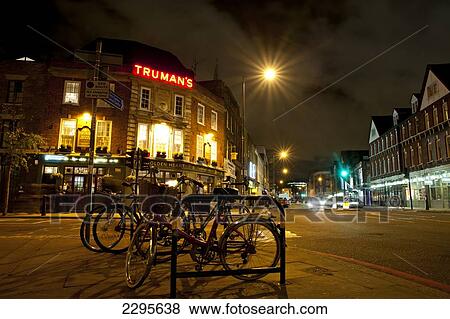 Bicycles Parked In Front Of The Golden Heart Pub In Spitalfields, East London, London, Uk View Large Photo Image Stock Photo - Bicycles Parked In Front Of The Golden Heart Pub In Spitalfields, East London, London, Uk. Fotosearch