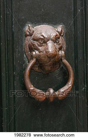 Stock Photo - Big Cat Door Knocker In The Old Quarter Of Venice; Venice Veneto Italy. Fotosearch