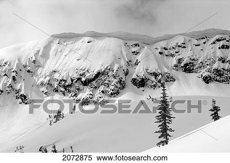 Big Cornices On Nak Peak, Thar Basin, Cascade Mountains, British Columbia View Large Photo Image Stock Photography - Big Cornices On Nak Peak, Thar Basin, Cascade Mountains, British Columbia. Fotosearch