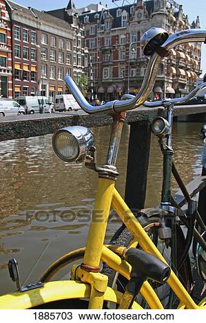 Bikes On The Singel Canal In Amsterdam View Large Photo Image Stock Image - Bikes On The Singel Canal In Amsterdam. Fotosearch