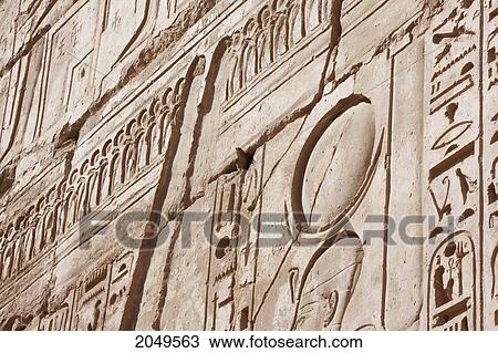 Stock Image - Bird On A Wall Of The Mortuary Temple Of Ramses Iii, Medinat Habu, Luxor, Qina, Egypt. Fotosearch