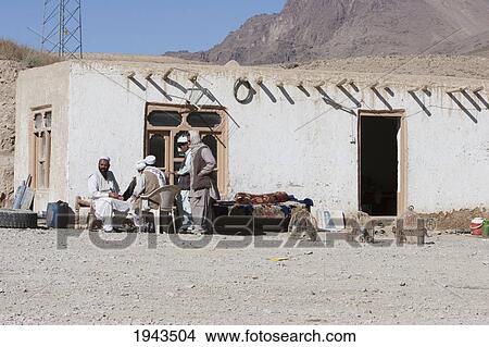Picture - Birds In Cages For Sale By A House Along The Kabul To Sarobi Road, Kabul Province, Afghanistan. Fotosearch