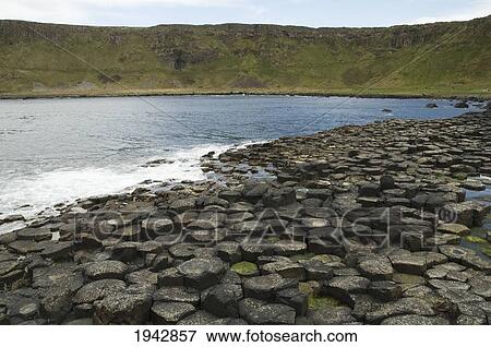 Black Basalt Columns Sticking Out Of The Sea, Giant's Causeway, Northern Ireland, United Kingdom View Large Photo Image Stock Photo - Black Basalt Columns Sticking Out Of The Sea, Giant's Causeway, Northern Ireland, United Kingdom. Fotosearch