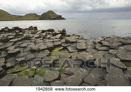 Black Basalt Columns Sticking Out Of The Sea, Giant's Causeway, Northern Ireland, United Kingdom View Large Photo Image Stock Photo - Black Basalt Columns Sticking Out Of The Sea, Giant's Causeway, Northern Ireland, United Kingdom. Fotosearch
