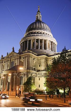 Stock Photo - Black Cab Passing St Paul's Cathedral, Blurred Motion. Fotosearch