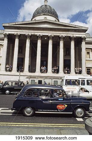 Stock Photo - Black Cabs Driving By National Gallery. Fotosearch