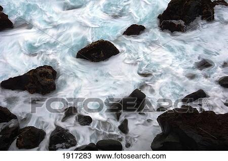 Black Volcanic Rocks In Sea View Large Photo Image Stock Image - Black Volcanic Rocks In Sea. Fotosearch