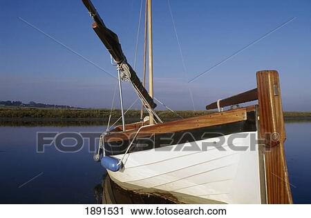 Stock Image - Blakeney Boat On River. Fotosearch