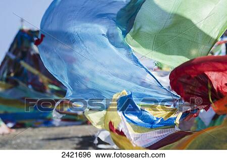 Blessing colourful Tibetan prayer flags (Lung ta) under the blue sky; Tibet View Large Photo Image Stock Photograph - Blessing colourful Tibetan prayer flags (Lung ta) under the blue sky; Tibet. Fotosearch