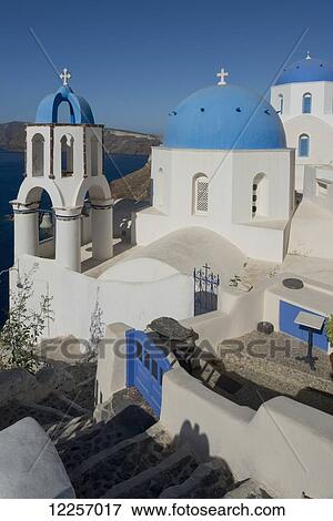 Blue domed churches overlooking the caldera; Oia, Santorini, Cyclades, Greek Islands, Greece View Large Photo Image Stock Photo - Blue domed churches overlooking the caldera; Oia, Santorini, Cyclades, Greek Islands, Greece. Fotosearch