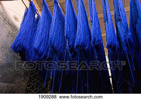 Stock Photo - Blue Dyed Cloth Hanging Up To Dry In Souks Of Marrakesh, Morocco. Fotosearch
