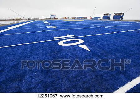 Stock Photo - Blue field of the Barrow High Whalers; Barrow, Alaska, United States of America. Fotosearch