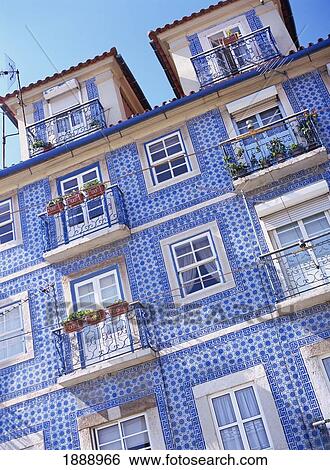 Stock Photograph - Blue Tiles Building With Balconies, Low Angle View. Fotosearch