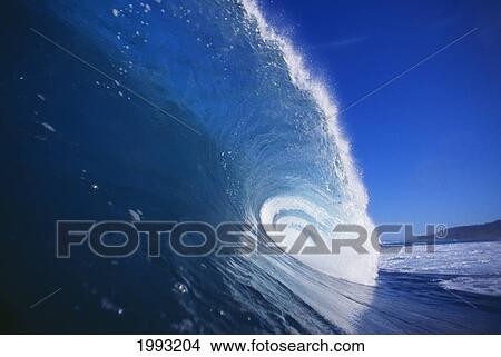 Blue Wave Curling, Closeup Side View With Blue Skies. View Large Photo Image Picture - Blue Wave Curling, Closeup Side View With Blue Skies.. Fotosearch
