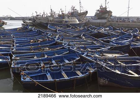 Stock Photograph - Blue Wooden Fishing Boats At The Harbor In Essaouira, Essourira, Morocco. Fotosearch
