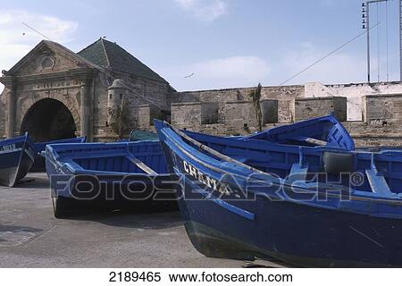 Blue Wooden Fishing Boats At The Harbor In Essaouira, Essourira, Morocco View Large Photo Image Stock Photography - Blue Wooden Fishing Boats At The Harbor In Essaouira, Essourira, Morocco. Fotosearch