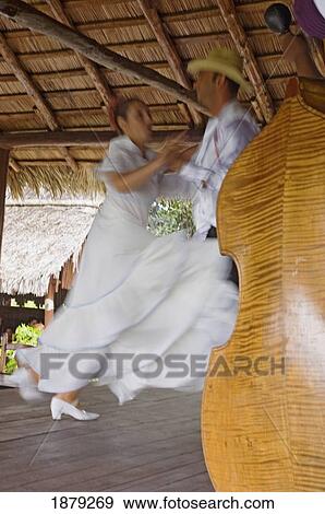 Blurred Dancers Performing At Mirador De Mayabe Restaurant In Holguin. View Large Photo Image Stock Photo - Blurred Dancers Performing At Mirador De Mayabe Restaurant In Holguin.. Fotosearch