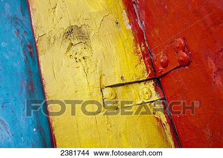 Picture - Boards of a church in a row painted blue, yellow and red; Ethiopia. Fotosearch
