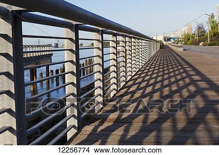 Boardwalk along the Fraser River; New Westminster, British Columbia, Canada View Large Photo Image Picture - Boardwalk along the Fraser River; New Westminster, British Columbia, Canada. Fotosearch