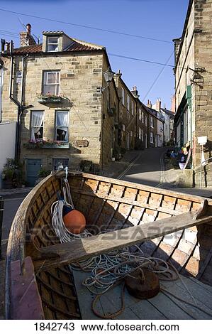 Boat And Houses; Robin Hoods Bay, North Yorkshire, England, Uk View Large Photo Image Stock Image - Boat And Houses; Robin Hoods Bay, North Yorkshire, England, Uk. Fotosearch