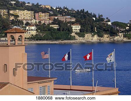 Stock Photo - Boat Coming Into Harbor Of Villefranche. Fotosearch