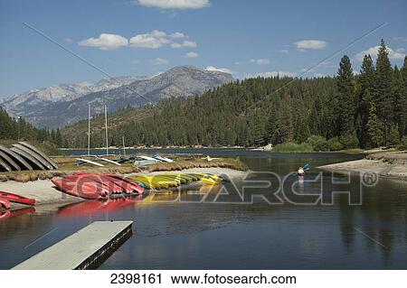 Boat dock and kayaks lined up on the shore at Hume Lake, Kings Canyon National Park; California, United States of America View Large Photo Image Stock Image - Boat dock and kayaks lined up on the shore at Hume Lake, Kings Canyon National Park; California, United States of America. Fotosearch