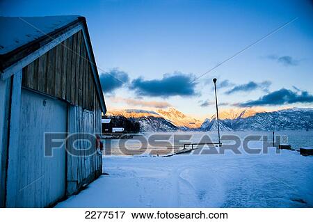 Stock Photo - Boat house at ferry port in the Fjord; Ortnevik, Sognefjord, Norway. Fotosearch