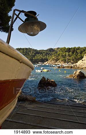 Stock Image - Boat In Fornells Beach In Begur. Fotosearch