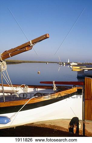 Stock Photograph - Boat In Harbor, Blakeney, Norfolk, England. Fotosearch