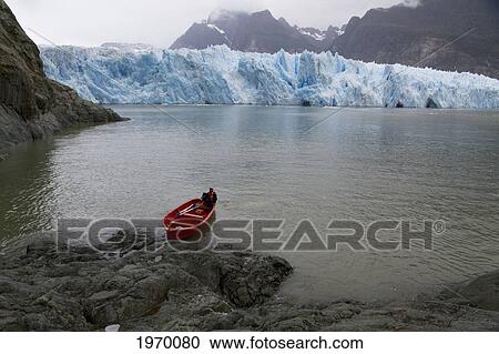 Stock Image - Boat In Laguna San Rafael In Front Of San Rafael Glacier, Laguna San Rafael National Park, Aysen Region, Chile. Fotosearch