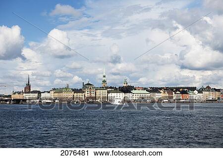Boat In The Water And Buildings Along The Water's Edge; Stockholm Sweden View Large Photo Image Stock Image - Boat In The Water And Buildings Along The Water's Edge; Stockholm Sweden. Fotosearch