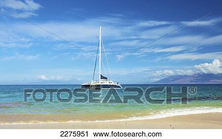 Boat mooring in the water off the shore of an hawaiian island; Hawaii, United States of America View Large Photo Image Stock Image - Boat mooring in the water off the shore of an hawaiian island; Hawaii, United States of America. Fotosearch