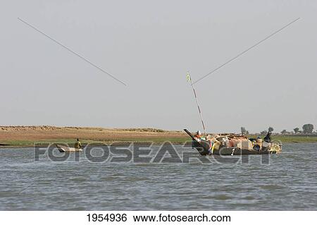 Boat on the Niger River between Lake Debo and Sebi, Mali View Large Photo Image Stock Photograph - Boat on the Niger River between Lake Debo and Sebi, Mali. Fotosearch