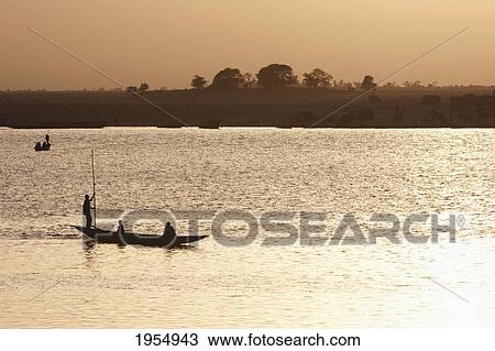 Stock Image - Boat on the Niger River in Mopti, Mali. Fotosearch