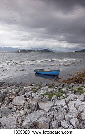 Boat Sitting In Water Along Shore View Large Photo Image Stock Image - Boat Sitting In Water Along Shore. Fotosearch