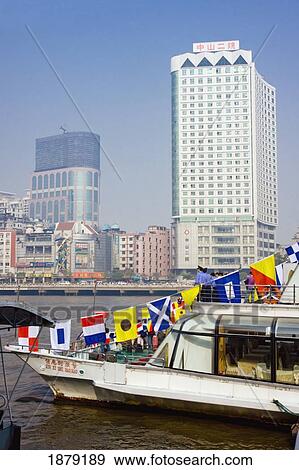 Stock Photo - Boat With Flags On River. Fotosearch