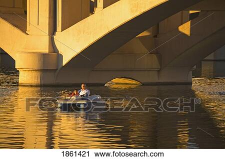 Stock Image - Boating On Tempe Town Lake & Mill Avenue Bridge, Tempe, Arizona, Usa. Fotosearch