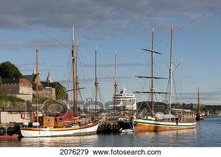 Stock Photo - Boats And A Ship In The Harbour Of Oslofjord; Oslo Norway. Fotosearch