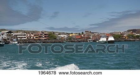 Boats And Buildings Along The Coastline; Puerto Baquerizo Moreno San Cristobal Island Galapagos Equador View Large Photo Image Stock Photo - Boats And Buildings Along The Coastline; Puerto Baquerizo Moreno San Cristobal Island Galapagos Equador. Fotosearch