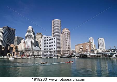 Stock Image - Boats And Highrise Buildings. Fotosearch