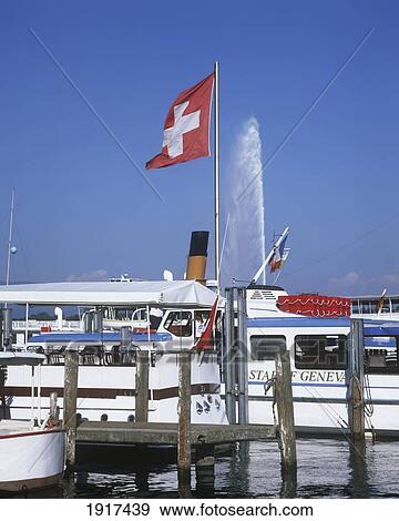 Boats And Jet D'eau And Swiss Flag At Lake Leman View Large Photo Image Stock Photo - Boats And Jet D'eau And Swiss Flag At Lake Leman. Fotosearch