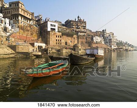 Stock Image - Boats And Varanasi Cityscape; India. Fotosearch