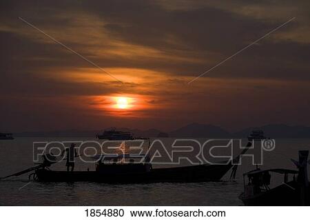 Boats At Sunset, Krabi, Thailand View Large Photo Image Stock Image - Boats At Sunset, Krabi, Thailand. Fotosearch