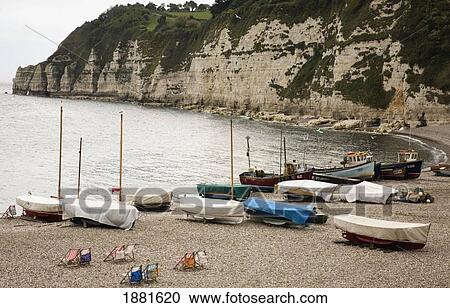 Boats Covered On The Shore; Beer, Devon, England View Large Photo Image Stock Image - Boats Covered On The Shore; Beer, Devon, England. Fotosearch