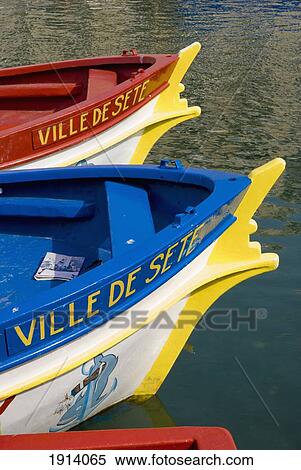 Stock Photography - Boats Floating In Water. Fotosearch