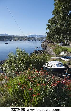 Boats in a harbour; Skye, Scotland View Large Photo Image Stock Photo - Boats in a harbour; Skye, Scotland. Fotosearch