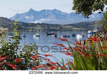 Stock Photography - Boats in a harbour; Skye, Scotland. Fotosearch