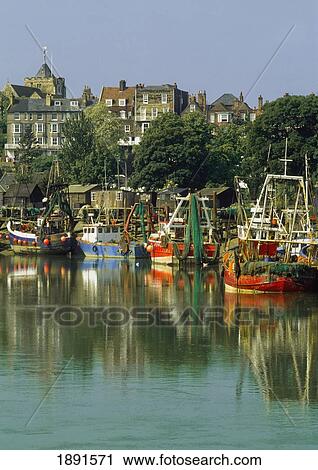 Stock Image - Boats In Harbor At Rye. Fotosearch